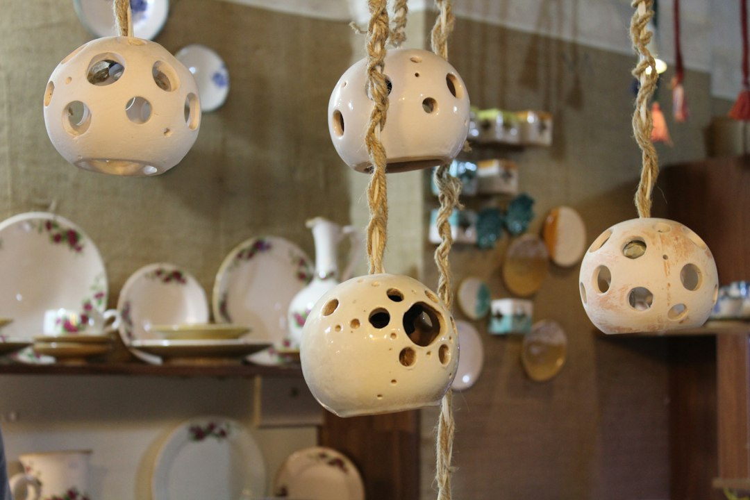 Photo bohemian white ceramic cabinet lighting